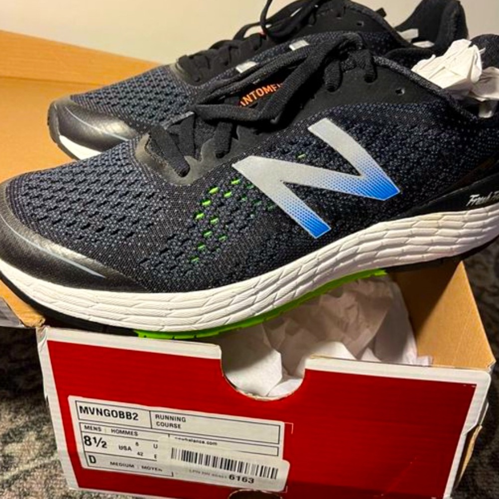 new balances. 8.5 in men.running shoes.worn them once for track!not dirty at all